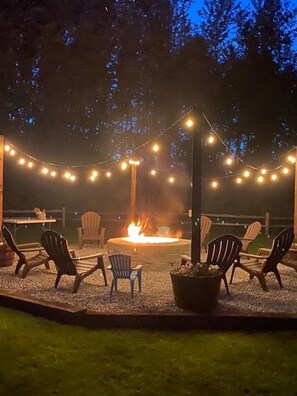 Unwind by the fire pit- perfect for roasting marshmallows and making beach memories.