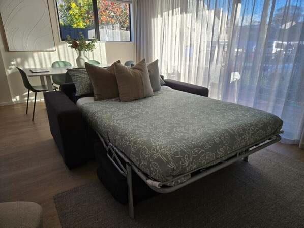 Actual photo of the sofa bed made up