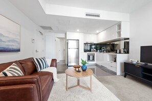 Put your feet up with 50' Smart TV...

