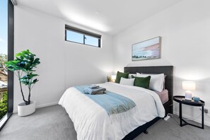 Close up the blinds for a sleep in + ducted air-con throughout...
