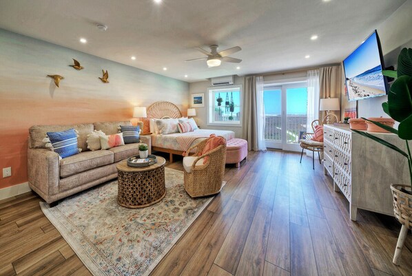 Queen sleeper sofa and a king bed.