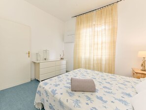 Furniture, Interior Design, Flooring, Wall, Floor, Bedroom, Wood, Bed, Room, Ceiling