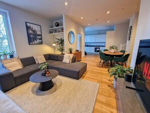 Relax with family and friends in our super stylish living space 