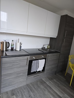 Modern fitted kitchen with all the basic essentials.