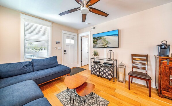 Spacious living area with modern comfort, perfect for relaxing
