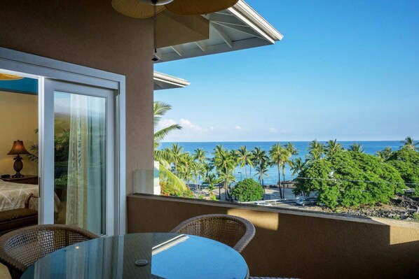 Lanai with table and ocean view