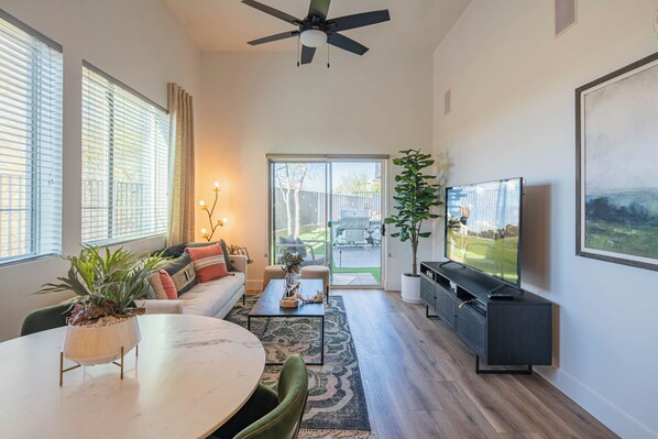 A compact, stylish dining table nestled in an open space, perfect for intimate meals.