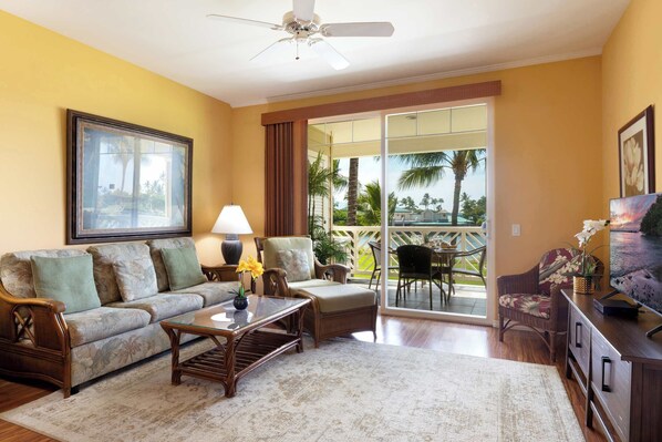 Golf course front living room with cable TV, DVD player and lanai access