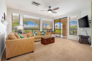 Living room with comfortable seating and flat screen TV