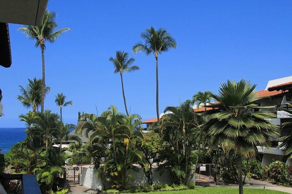Lanai with courtyard & partial ocean view