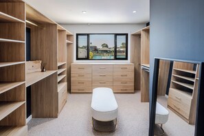 Master Suite - double shower, bath, sauna, walk-in-robe with pool & lake view