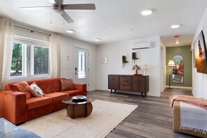 View of the entrance, leading to the living room and game room hallway