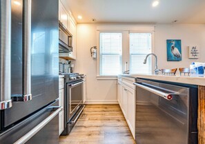 Fully equipped kitchen with stainless steel appliances