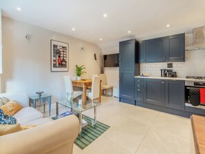 Open plan living space | Woodcutter Cabin - Beechlawn Holidays, Leatherhead