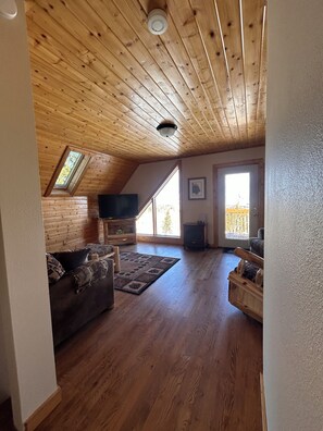 Second floor family room with deck, view of Antero Reservoir and mountains.