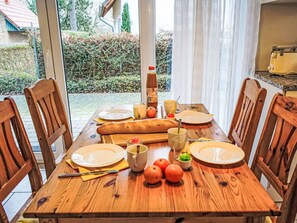 Furniture, Wood, Table, Tableware, Kitchen & Dining Room Table, Food, Dining Room, Chair, Interior Design, Flooring