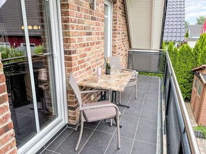 Furniture, Chair, Balcony, Outdoor Furniture, Brick, Outdoor Table, Wood Stain, Patio, Porch, Deck