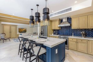 "Fully equipped kitchen"
