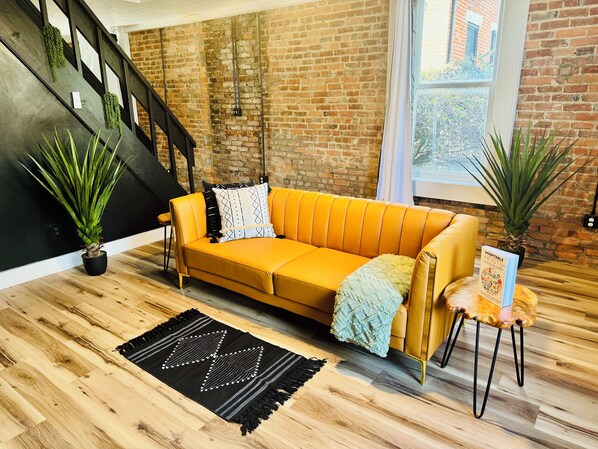 Movie nights & cozy vibes—this modern living room is your home away from home. 🎬🍿 #DowntownStay