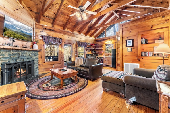 Curl up in the cozy living room & enjoy a fireside movie night at home