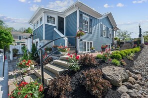 Beautiful side/rear entry with gardens.