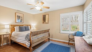 Lovely primary bedroom providing ultimate comfort with a queen sized bed.