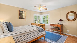 Lovely primary bedroom providing ultimate comfort with a queen sized bed.