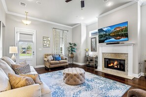 The living room features a gas fireplace