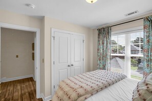 Master Bedroom -- Queen bed with closet storage and designated work desk + ergonomic chair for extra comfort