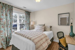 Master Bedroom -- Queen bed with closet storage and designated work desk + ergonomic chair for extra comfort