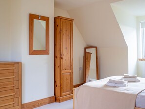 Furniture, Interior Design, Wood, Flooring, Bed, Floor, Bedroom, Room, Drawer, Lighting