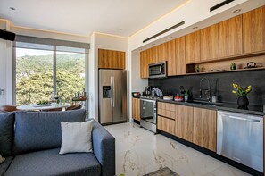 Create unforgettable meals in this kitchen, featuring a 6-burner gas stove and all the cookware you need for a perfect culinary experience in Puerto Vallarta.