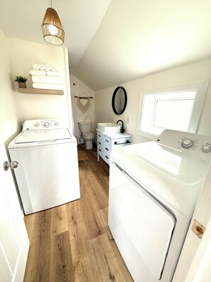washer and dryer w/ laundry detergent 