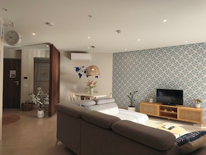 Sala de estar com sofá-cama