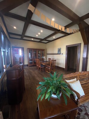 Dining room - side porch can be reached from door t left.