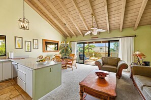 Open concept living with vaulted ceiling
