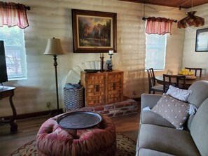 Living room: walls constructed of adobe brick-well insulated against summer heat