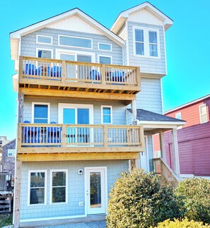 Spacious beach house with multiple decks, ocean views, and perfect for families!
