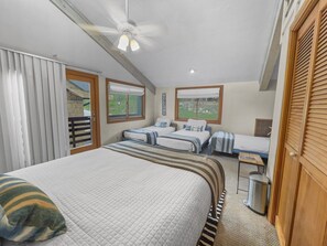 second bedroom with Queen and 3 twin beds