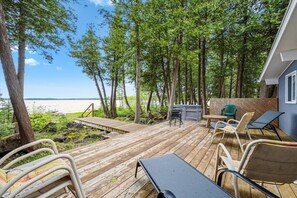 The large lakeside deck is your outdoor living room—ideal for sunbathing, dining al fresco, or just soaking up the views of Berford Lake.