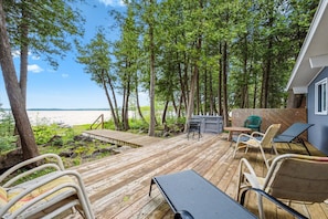 The large lakeside deck is your outdoor living room—ideal for sunbathing, dining al fresco, or just soaking up the views of Berford Lake.