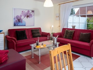 Furniture, Interior Design, Couch, Flooring, Living Room, Floor, Wood, Room, Table, Apartment