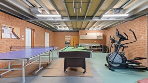Enjoy friendly competition with the perfect indoor games setup for guests of all ages.