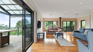 Comfortable seating and fresh air with easy access to the balcony.