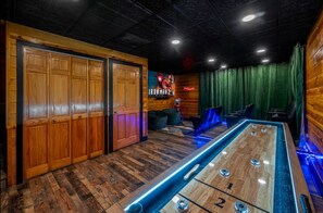 Equipped with a custom game and movie room, there's no being bored in this cabin