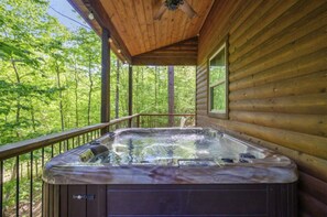 Hot Tub Retreat: Unwind in the bubbling bliss surrounded by lush woodland views!