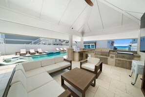Pink Tequila Sunrise | Outdoor Entertainment Area | Heated Pool | Hot Tub | Outdoor Kitchen | Fire Pit