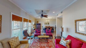 The open floor plan makes entertaining a breeze. The living, dining, and kitchen areas blend seamlessly, allowing you to enjoy more time with loved ones as you move throughout the home.