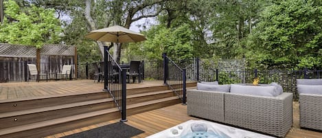 Wraparound deck with hot tub, fire pit, seating, grill, and amazing views
