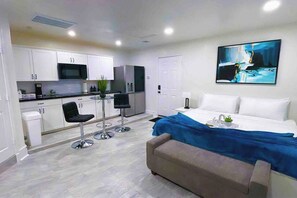 Bed and kitchen area